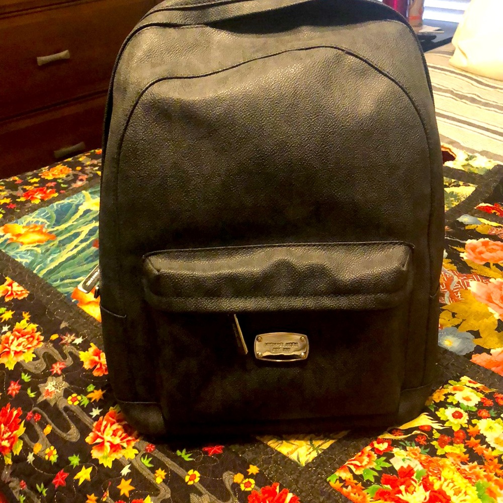 Michael Kors backpack and purses
